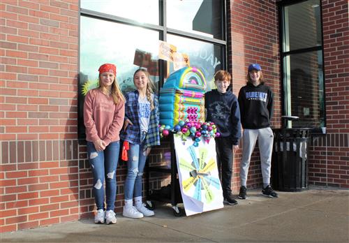 Student council members with jukebox